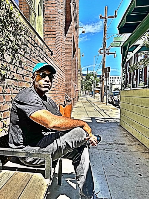 Pyramid Skeme Deep Fried Photo Sitting on a Bench